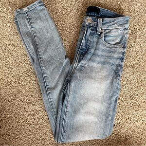 Buckle Black Skinny Jeans with Vintage-Inspired Wash